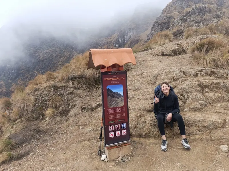 Hikers reaching Warmiwañusca Pass (Dead Woman’s Pass), the highest point of the Inca Trail